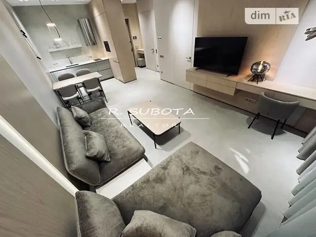 Two-bedroom apartment in Dnipro, Central District, at Korolenko Street 2K, for long-term monthly rental.