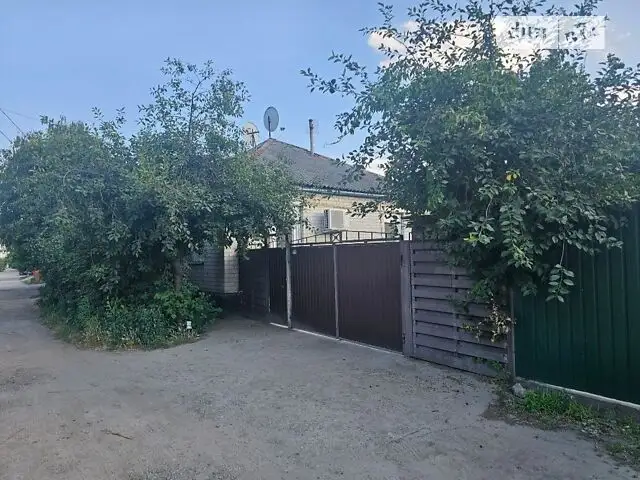 A two-story house with a garage, 75 sqm, brick construction. Available for monthly rent in Dnipro.